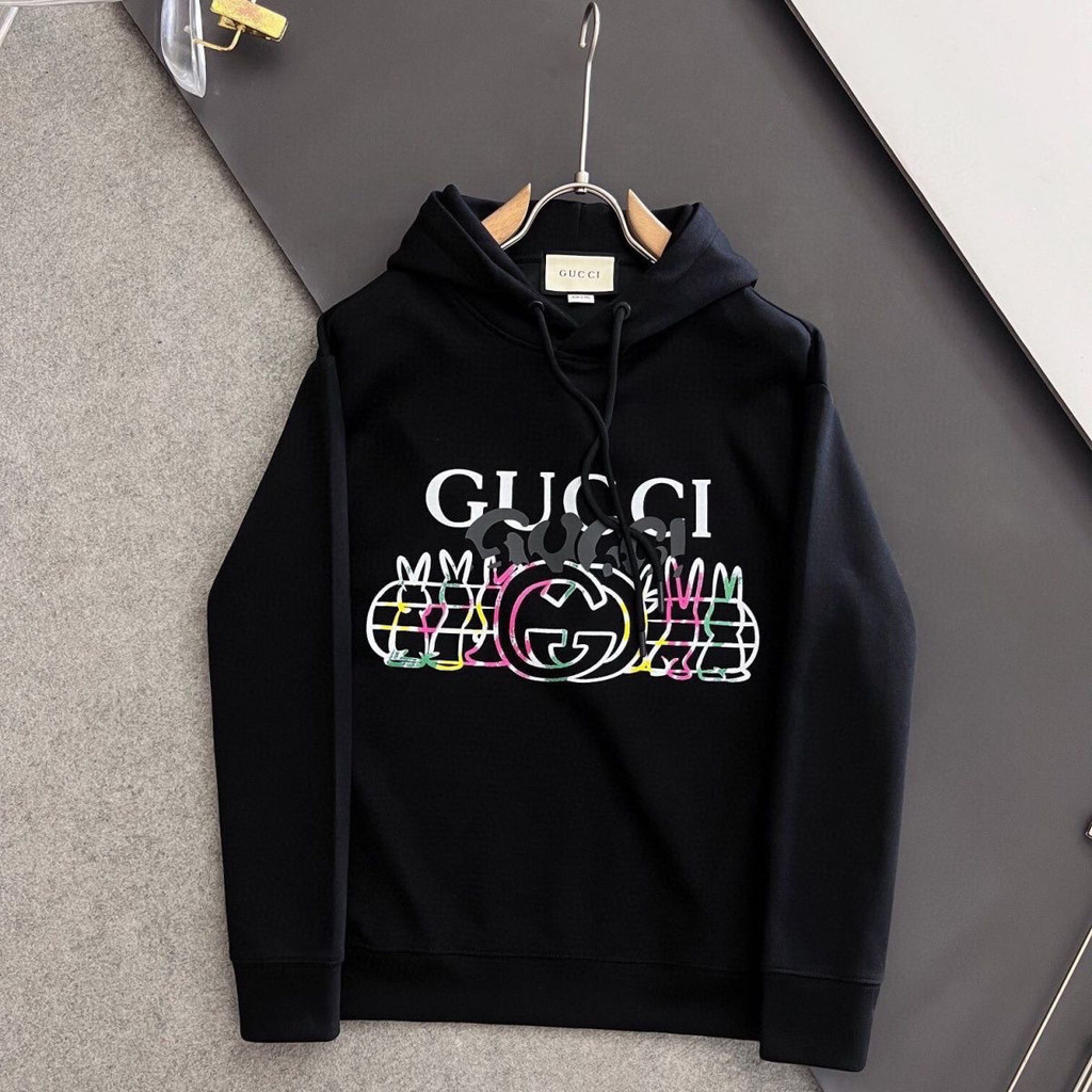 Gucci2023เสื้อสเวตเตอร์ผ้าฝ้ายแท้รุ่นใหม่ฤดูใบไม้ร่วงและฤดูหนาวมีฮู้ดพิมพ์ตัวอักษรแขนยาวชายหญิง ymzk