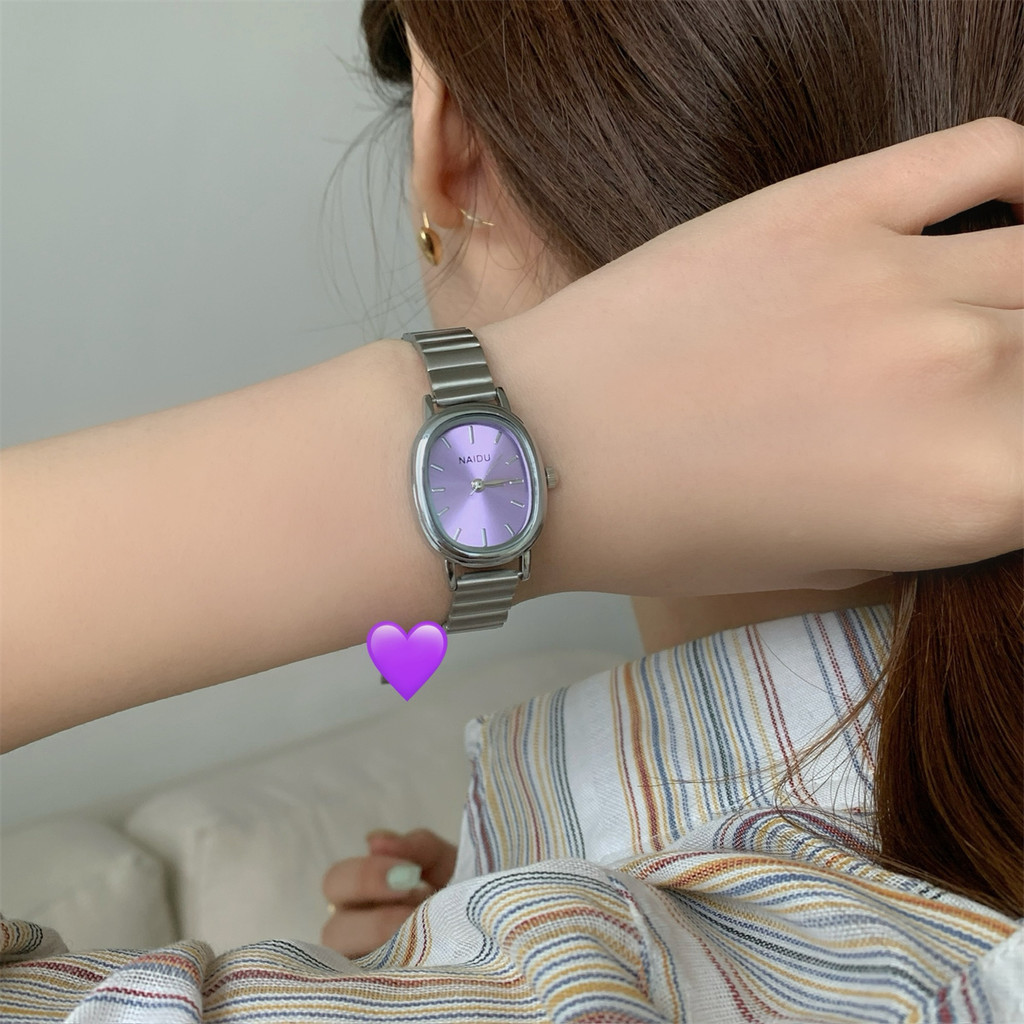 นาฬิการูปไข่สีม่วงผู้หญิง ins นาฬิกาแฟชั่นผู้หญิงวงเหล็กที่สวยงาม