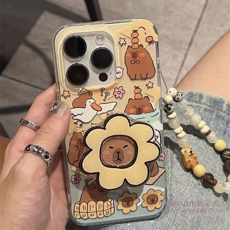 ใช้งานร่วมกับ iPhone 16 15 14 13 12 11 Pro Max X Xr Xs Max 7 8 Plus SE2020 เคสโทรศัพท์การ์ตูน Graffiti น่ารักดอกทานตะวันปักเป้า + ขาตั้งนุ่มปกหลัง