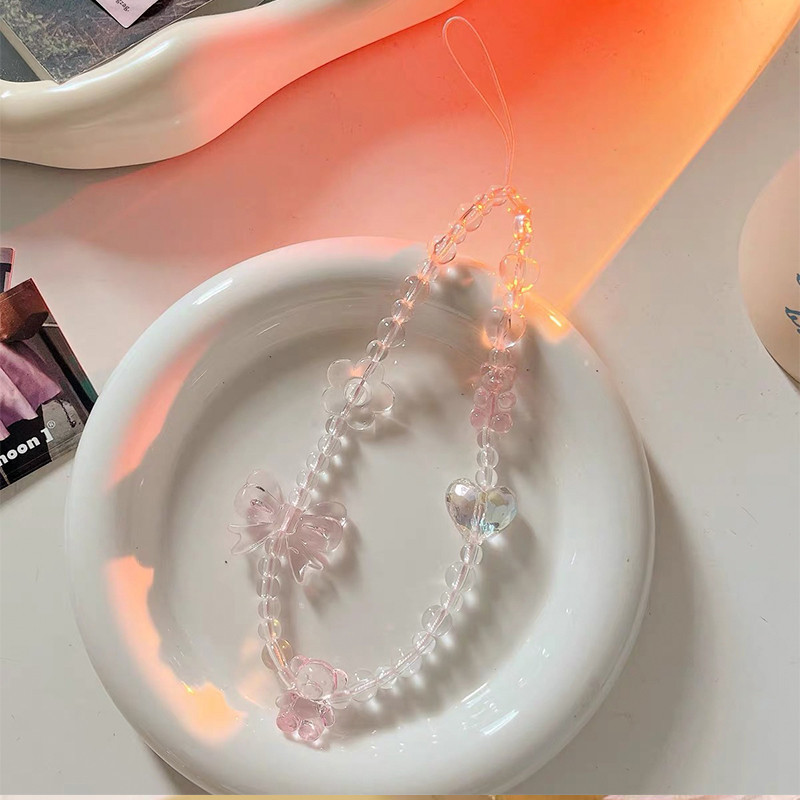 เคสโทรศัพท์มือถือที่ใช้งานได้ สายคล้องโทรศัพท์มือถือแบบ 3 มิติ สร้อยข้อมือเชือกคล้องคริสตัลแบบโบว์ สายคล้องคอดอกไม้ใส - รูปที่ 2