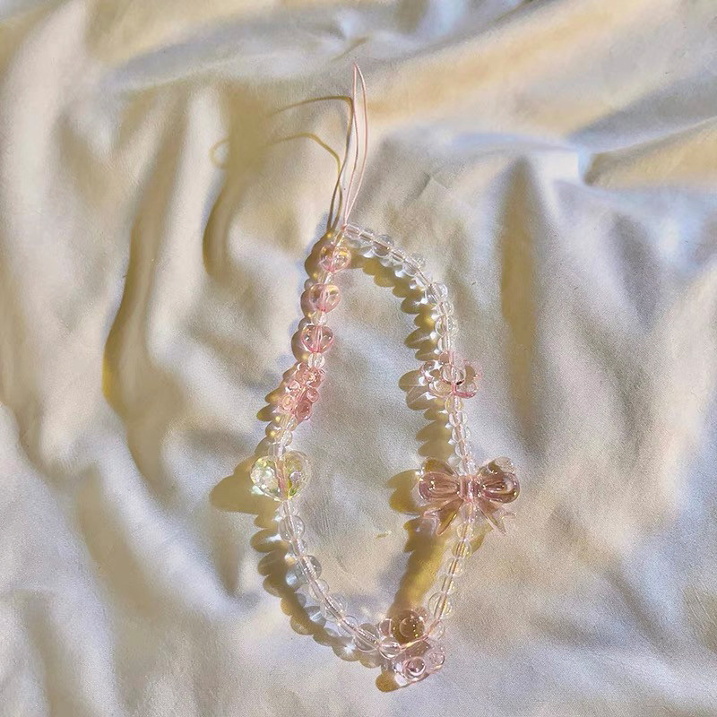 เคสโทรศัพท์มือถือที่ใช้งานได้ สายคล้องโทรศัพท์มือถือแบบ 3 มิติ สร้อยข้อมือเชือกคล้องคริสตัลแบบโบว์ สายคล้องคอดอกไม้ใส - รูปที่ 4