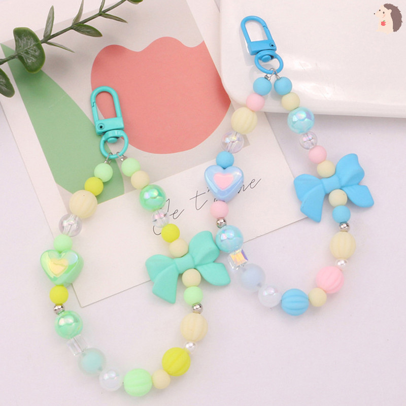 [IN] ที่มีสีสัน Bowknot ลูกปัดโซ่พวงกุญแจจี้สดสีหัวใจลูกปัดอุปกรณ์เสริมหูฟังกระเป๋า Charm ตกแต่ง TH