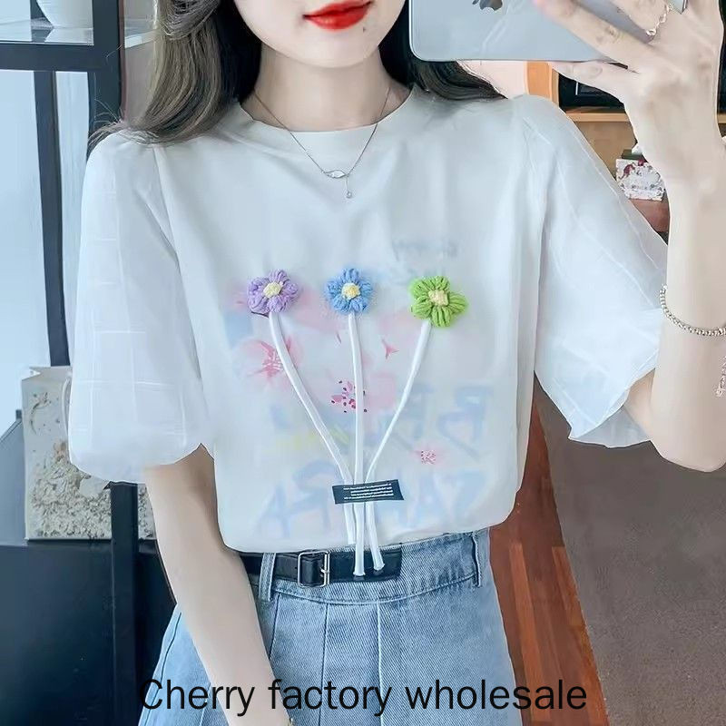 แฟชั่นผู้หญิงสไตล์ใหม่สีขาวพัฟแขนผ้าฝ้ายแท้แขนสั้นเสื้อยืดสามมิติดอกไม้อายุ @