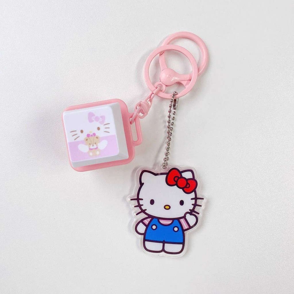 พวงกุญแจปุ่มจิ๋ว Hello Kitty Unzip