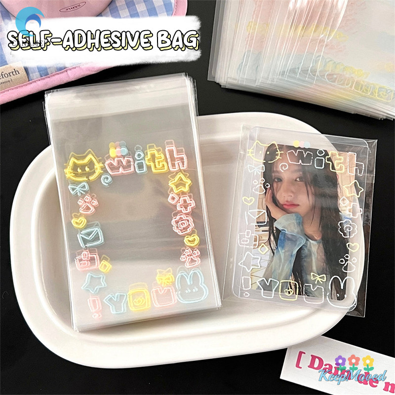 Keepmoved 100 ชิ้นการ์ตูน Graffiti ลูกแมว Self-Adhesive กระเป๋า Candy อาหารบรรจุภัณฑ์การ์ดถุงของขวัญขนาดเล็กถุงปิดผนึกด้วยตนเองโปร่งใส Opp กระเป๋าใหม่