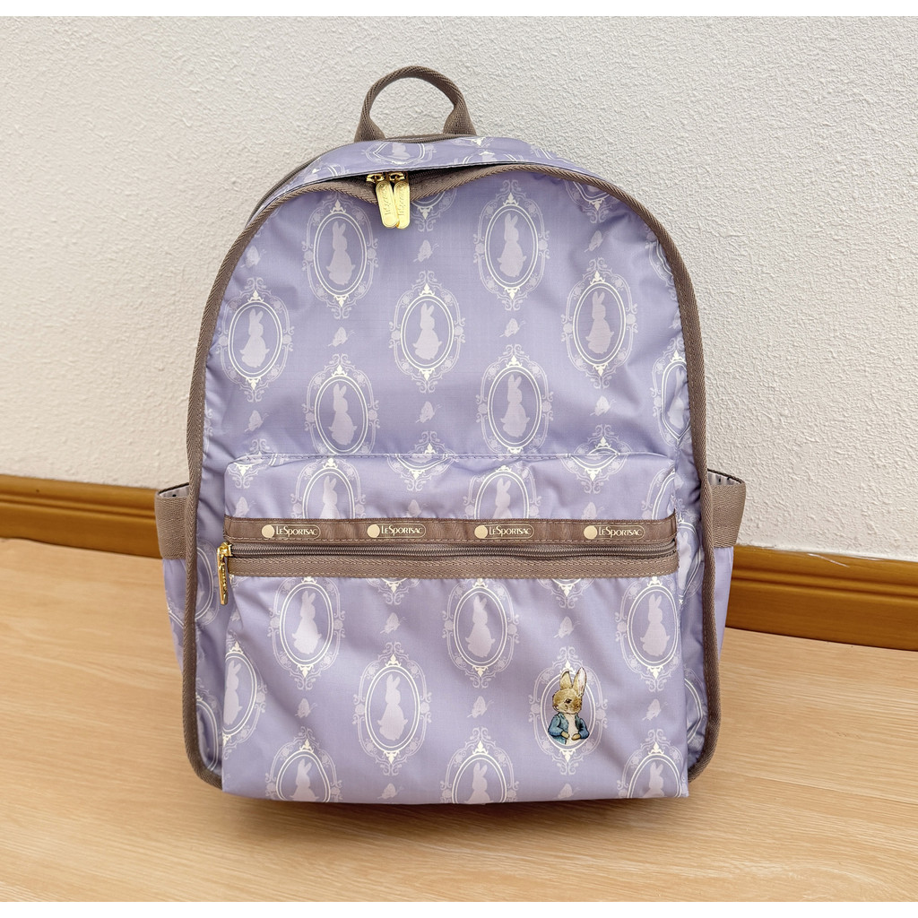 Lesportsac กระเป๋าเป้ความจุขนาดใหญ่แบรนด์ร่วมสไตล์ใหม่ Peter Rabbit สีม่วง