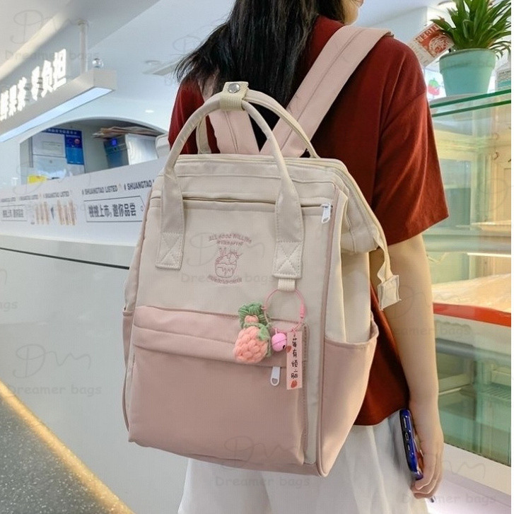 กระเป๋านักเรียนใส่ของได้เยอะลายโดนัทสีมาการองสไตล์เกาหลีสำหรับผู้หญิง