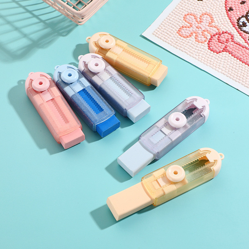 ยางลบเลื่อนสีโปร่งใสสร้างสรรค์ไม่มีเศษเครื่องเขียนนักเรียนแบบพับเก็บได้ WJ623