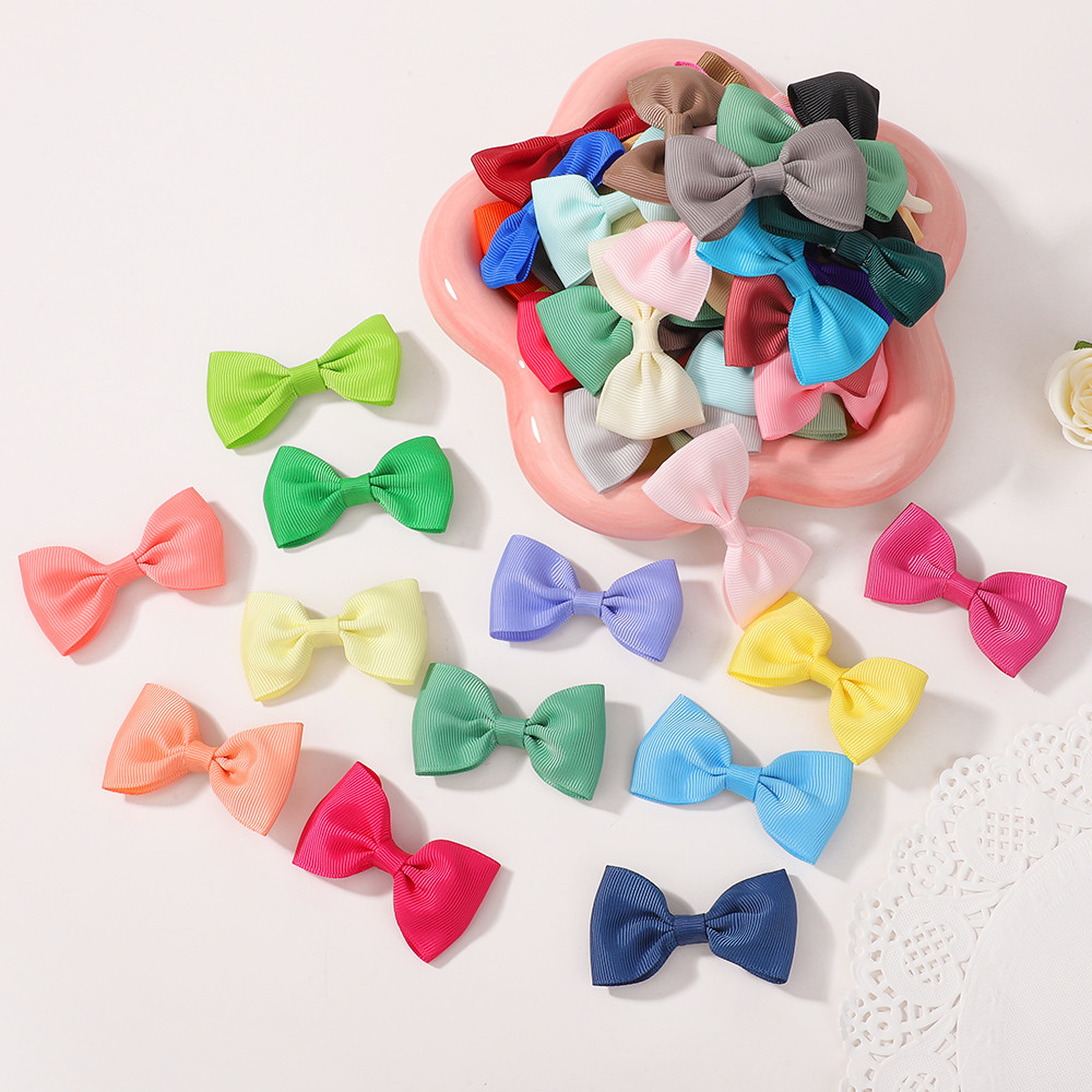 ริบบิ้นติดผมสำหรับเด็ก .Handmade Bow Knots และกิ๊บ 40 ชิ้น สินค้าเสริมความงามทรงผมสำหรับทารกและเด็ก