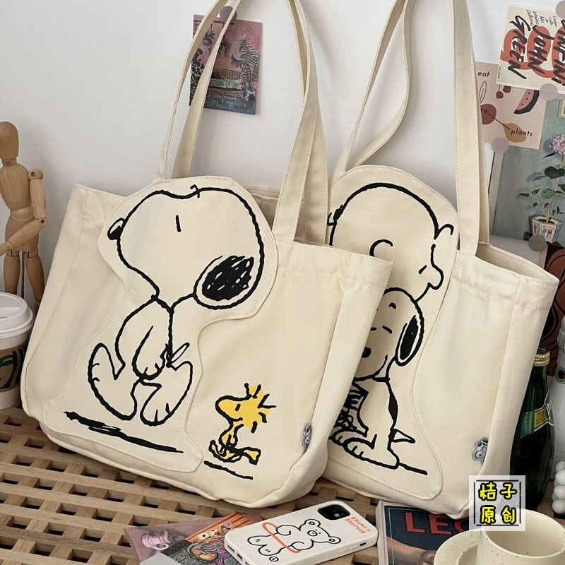 Snoopy Snoopy snoppy Original Canvas Bag กระเป๋าสะพายการ์ตูนน่ารักซิปความจุขนาดใหญ่นักเรียนหญิงกระเป๋าชั้นเสริม