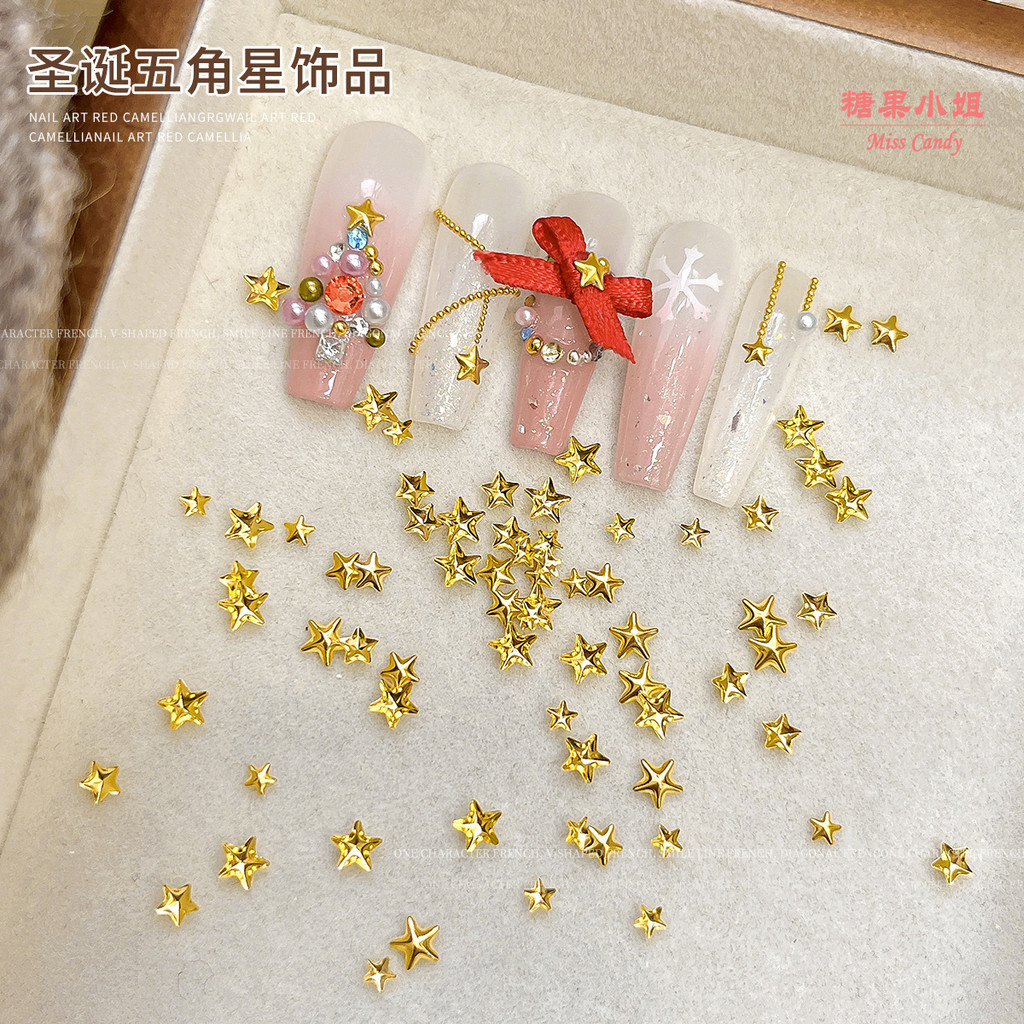เครื่องประดับแต่งเล็บดาวห้าแฉกคริสต์มาสสไตล์ใหม่สีทองมินิทุกการแข่งขันแบนสวมใส่เครื่องประดับเล็บ