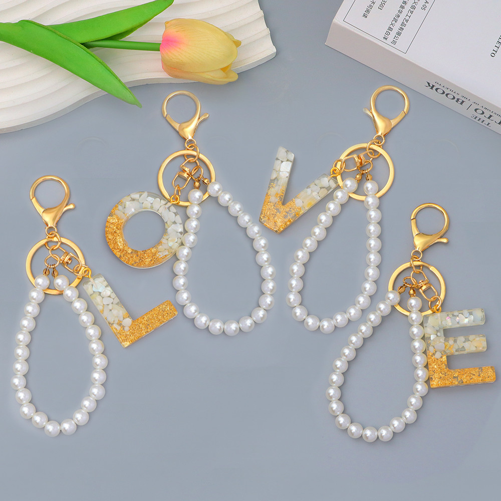 1 ชิ้นสีขาว AZ พวงกุญแจตัวอักษรแฟชั่นเลียนแบบ Pearl Chain 26 เริ่มต้น Keyrings กระเป๋าถือจี้อุปกรณ์เสริมของขวัญของที่ระลึก