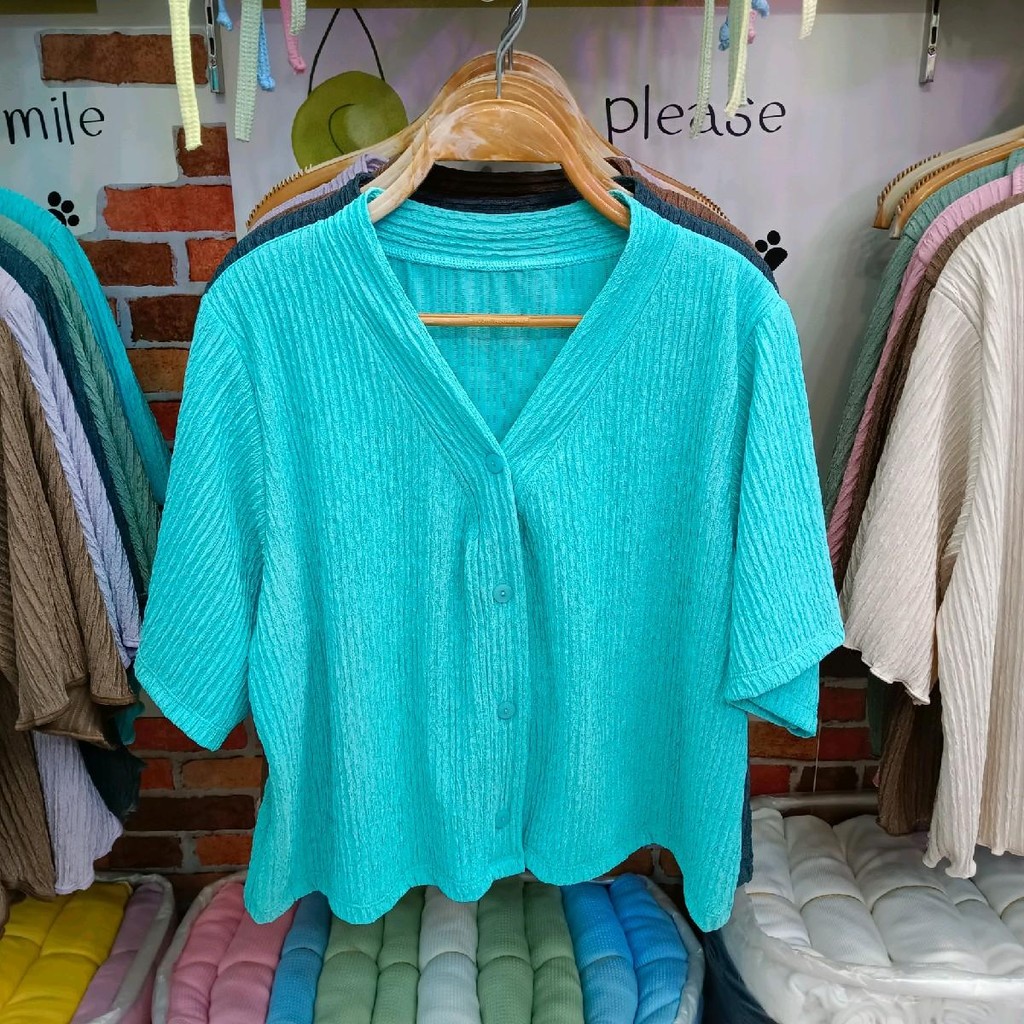 TM เสื้อผ้าร่อง ผ้าท๊อฟฟี่ คอวีกระดุม