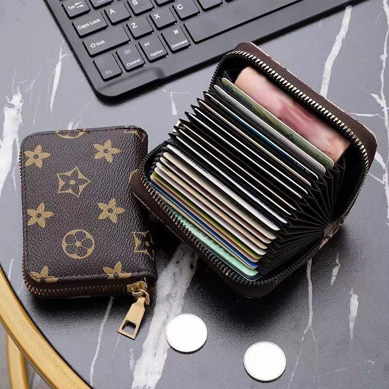 กระเป๋าสตางค์ใบสั้นผู้หญิงที่ทันสมัยและเรียบง่ายพร้อมกระเป๋าซิปใส่เหรียญกระเป๋าใส่บัตรที่ทันสมัย