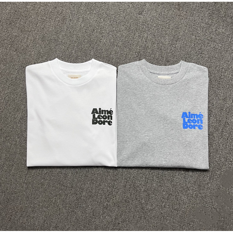 ღღ  🆕 สูง ถนน เสื้อยืดคอกลมแขนสั้นพิมพ์ลายตัวอักษรหลวมใหม่สําหรับผู้ชายและผู้หญิง