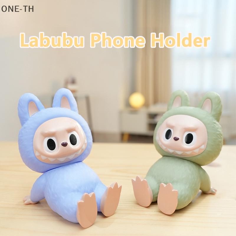 One-th การ์ตูน Labubu ผู้ถือโทรศัพท์ดูทีวีอะนิเมะตุ๊กตาเดสก์ท็อปเครื่องประดับ Universal แท็บเล็ตสําหรับ Iphone Samsung Xiaomi ใหม่