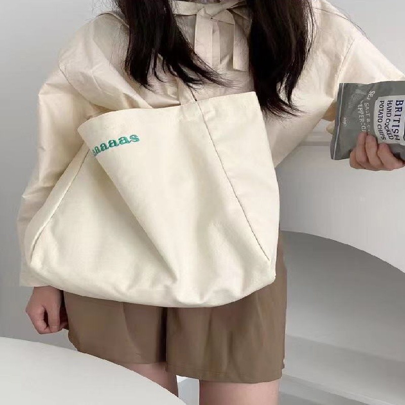 ญี่ปุ่นและเกาหลีลูกอมสีตัวอักษรผ้าใบกระเป๋านักเรียนในชั้นเรียนถุงเรียบง่ายความจุขนาดใหญ่ไหล่เดียวถุงช้อปปิ้ง