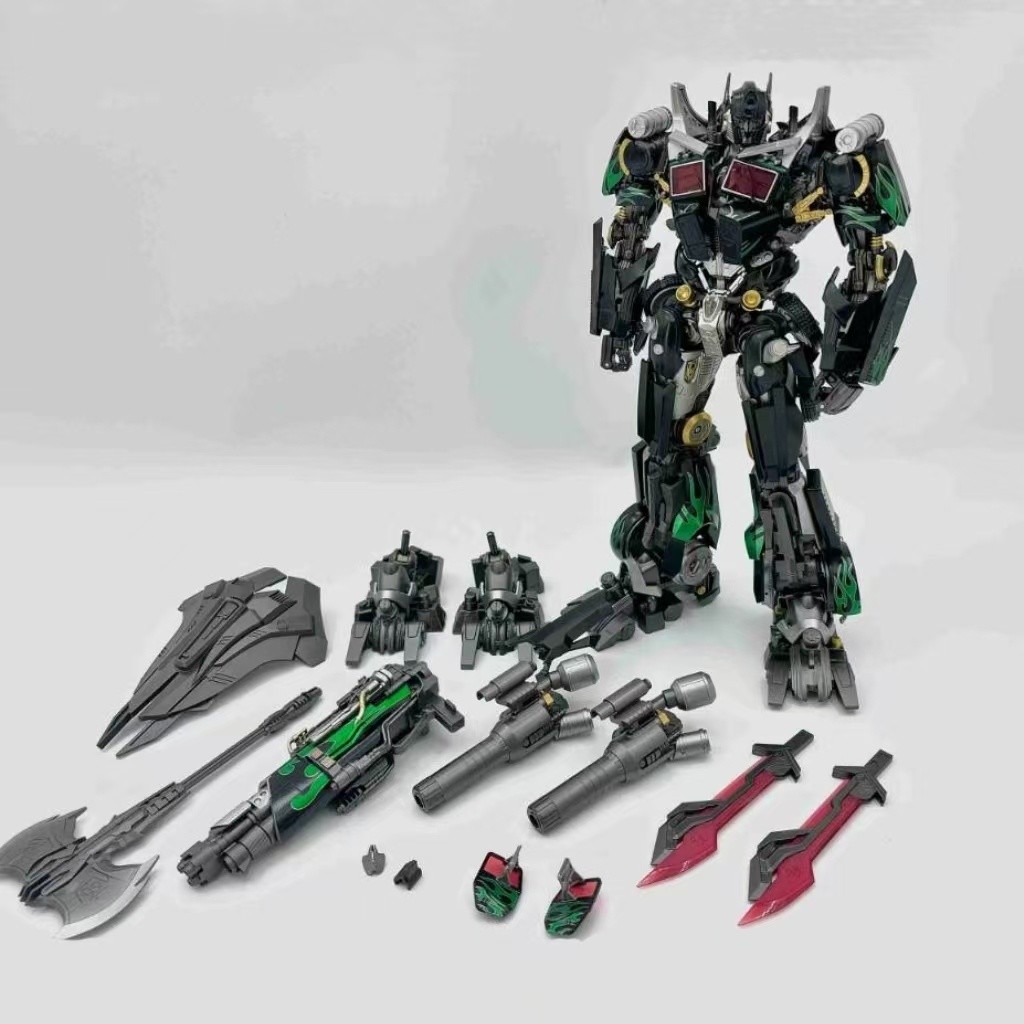 โมเดลการเปลี่ยนรูปขนาด DLX สีดำและเขียวของ Optimus Prime MC003B สำหรับตระเวนกลางคืน