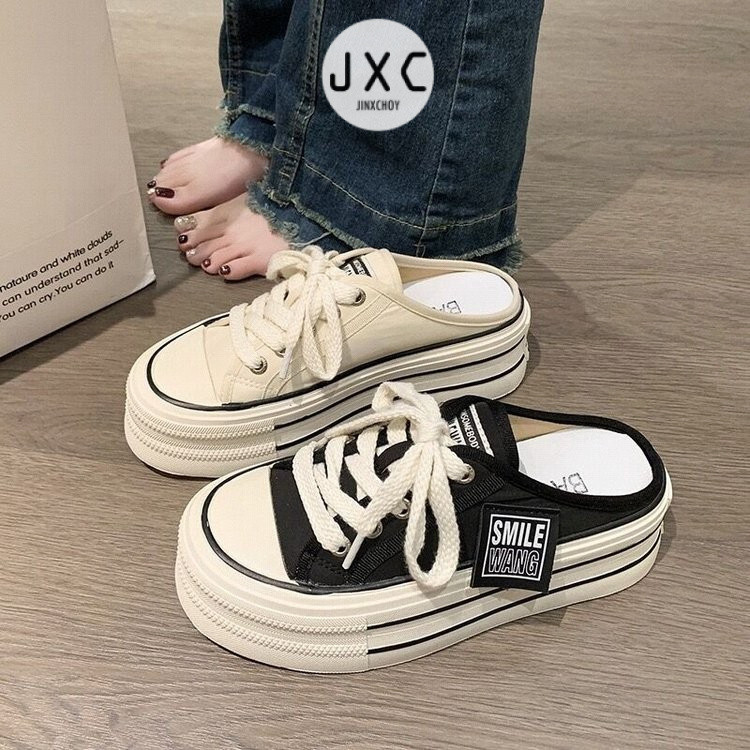 JINxCHOY แฟชั่นเกาหลีแมทช์ง่ายแพลตฟอร์มรองเท้าแตะผ้าใบแบบสวมครึ่งเท้าฤดูใบไม้ร่วงใหม่คลาสสิกสีดำและสีขาวสวมใส่ด้านนอกรองเท้าผ้าใบไม่มีส้นป่าขายส่งโรงงาน