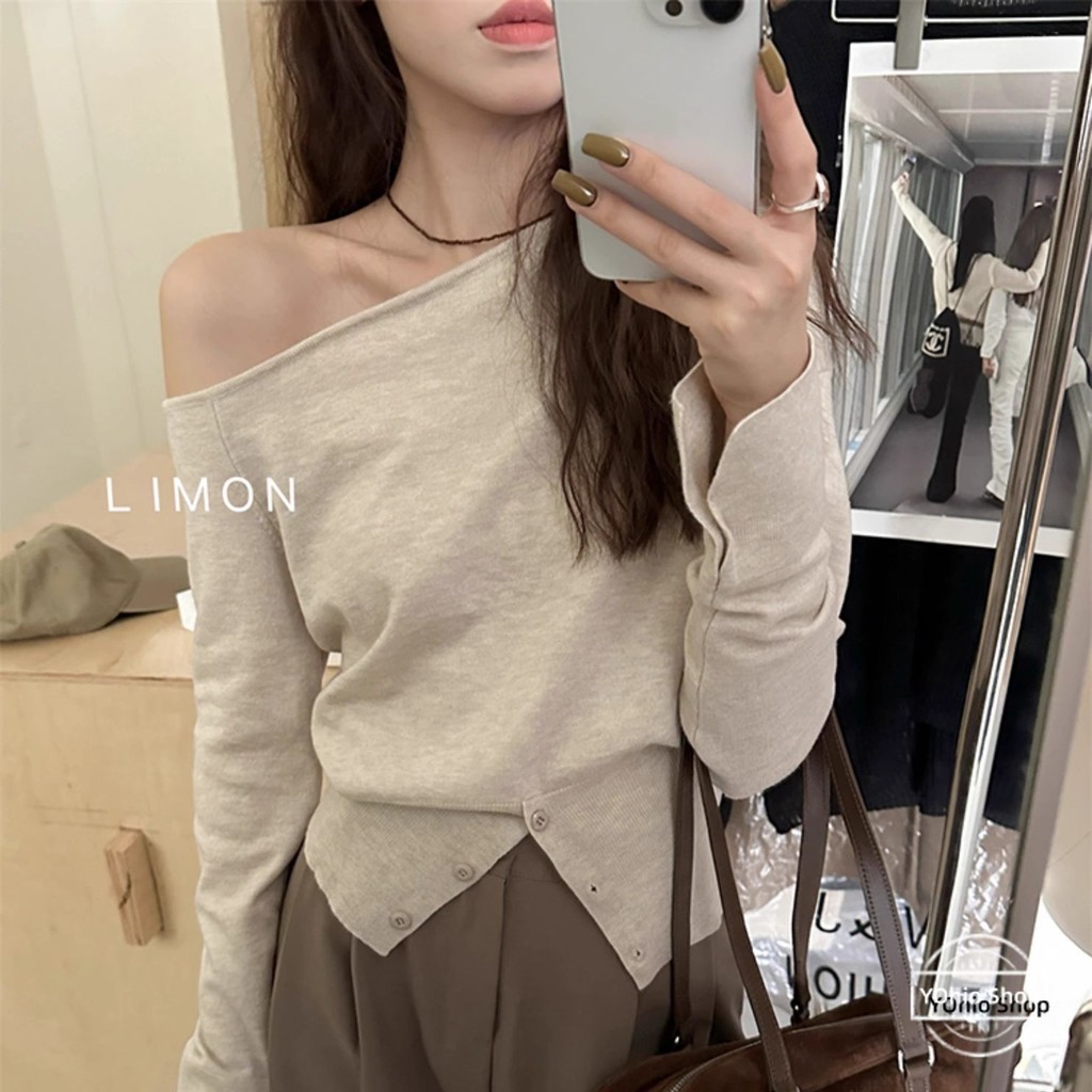 ผู้หญิงปกเอียงปิดไหล่ไหปลาร้าปุ่มแยกถักแขนยาวเสื้อยืด