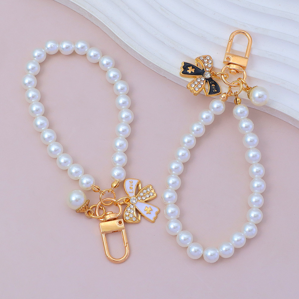 Simple Rhinestone เคลือบโบว์พวงกุญแจโรแมนติกเลียนแบบ Pearl พวงกุญแจเครื่องประดับกระเป๋า Charms ของขวัญ