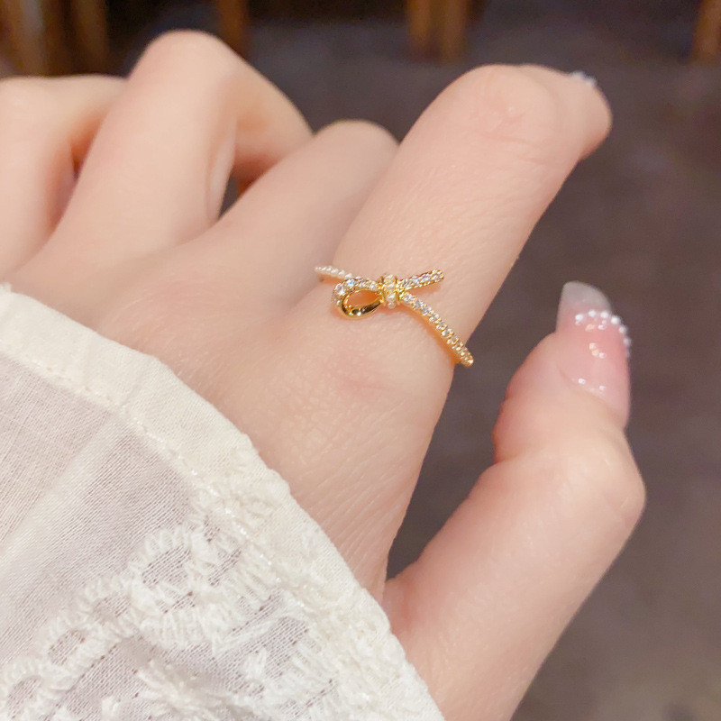 สไตล์ใหม่การออกแบบที่ทันสมัยเพทายผูกปมอารมณ์ที่เรียบง่ายแสงหรูหราระดับไฮเอนด์เปิดแหวน