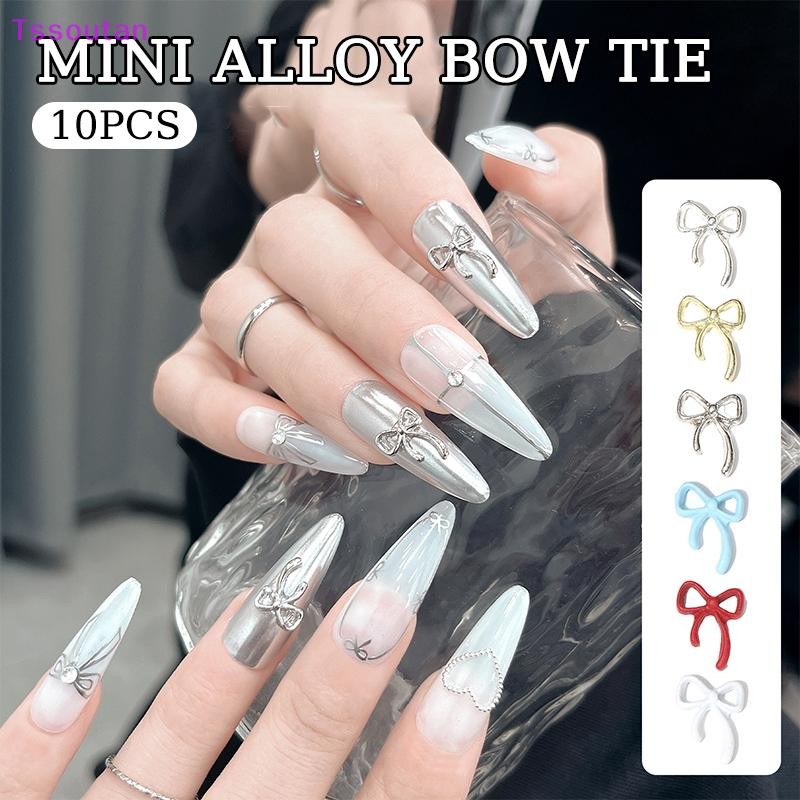 [TSST] 10 ชิ้น Kawaii Bowknot โลหะทองเงินเล็บ Ch 3D โลหะผสม Bow Tie เครื่องประดับเล็บ Rhinestone ตกแต่งเล็บเครื่องมือ TAN