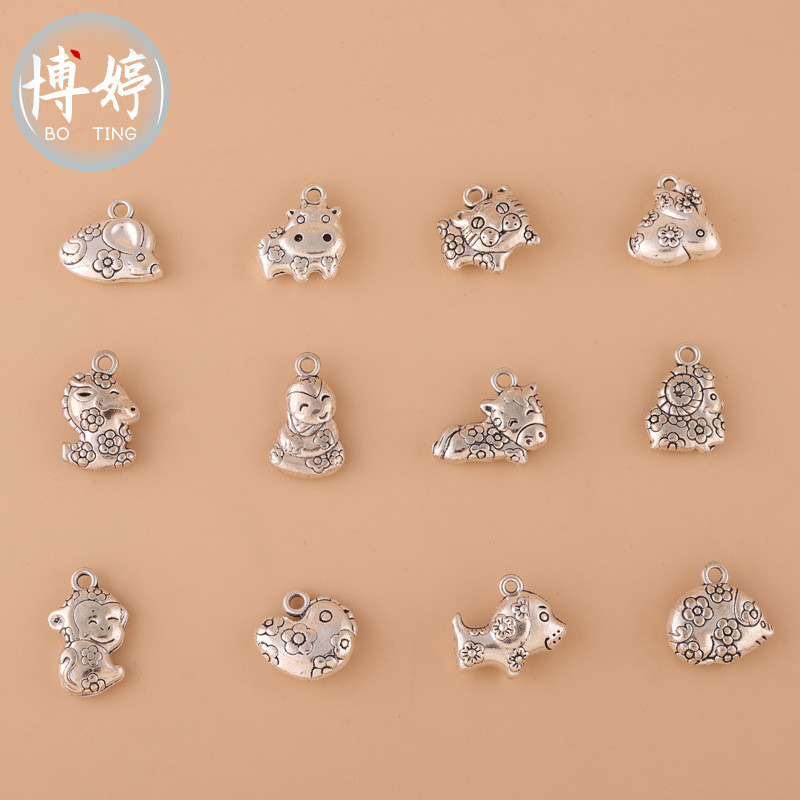 เงินทิเบตสองด้านสิบสองราศีทำด้วยมือเครื่องประดับ DIY สร้อยข้อมือจี้สร้อยคอเครื่องประดับความมั่งคั่งแ