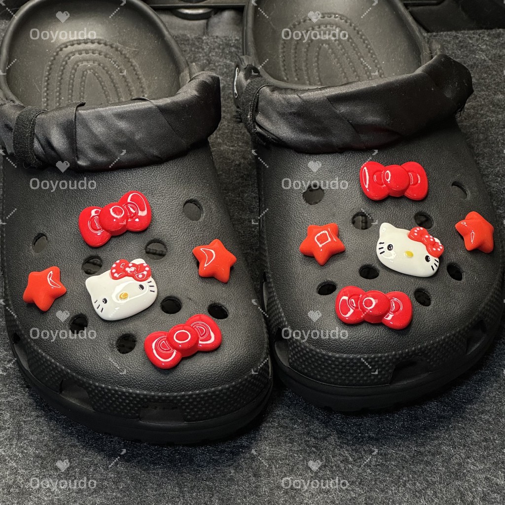 Red Star ริบบิ้น Hello Kitty ชุด clog Pins INS Charm ปุ่ม DIY อุปกรณ์เสริมสําหรับหัวเข็มขัดรองเท้าอุปกรณ์เสริมตกแต่งรองเท้า