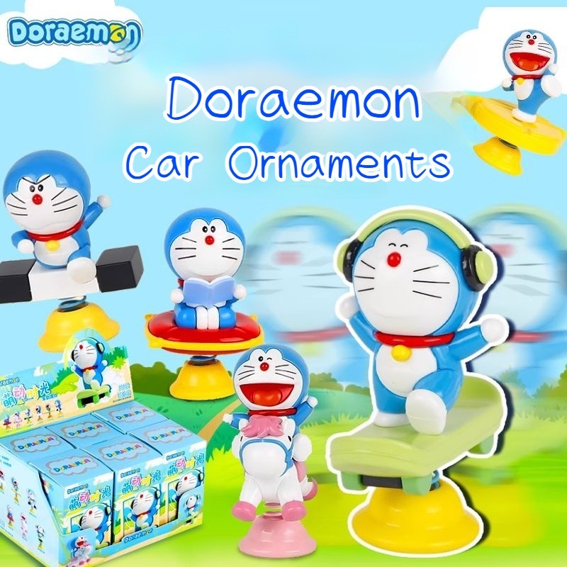 เครื่องประดับรถยนต์ที่สร้างสรรค์ของโดราเอมอนสวิงตกแต่งควบคุมกลางภายในน่ารักเล่นอินเทรนด์รูปเครื่องประดับตุ๊กตา