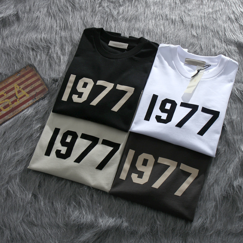 Essentia * S Summer Street Wear FOG1977 พิมพ์ Simple Number คู่ครึ่งแขนหลวมแขนสั้นเสื้อยืดผู้ชายผู้หญิง