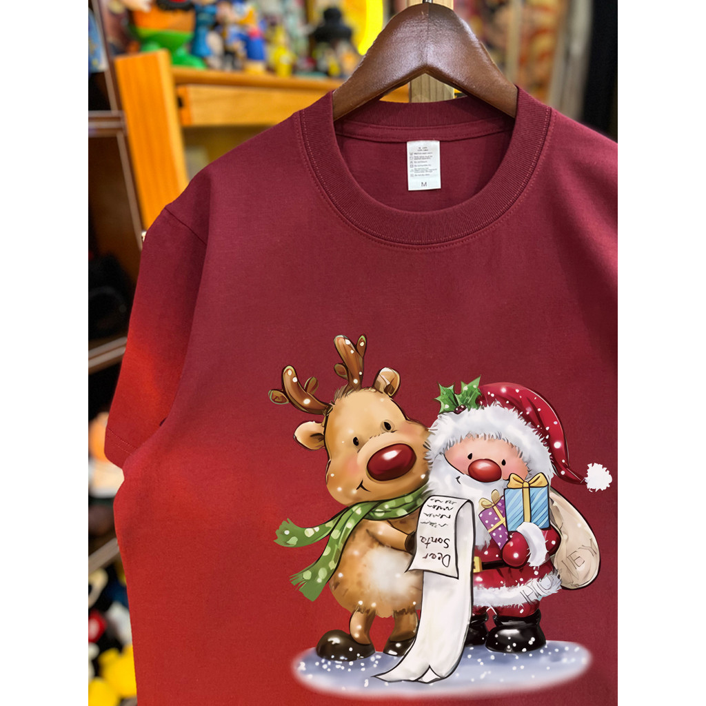 Nuziro เสื้อยืด oversize สีแดง - การ์ตูนน่ารักซานตาคลอสพิมพ์เสื้อยืดแขนสั้นหลวม #I001127