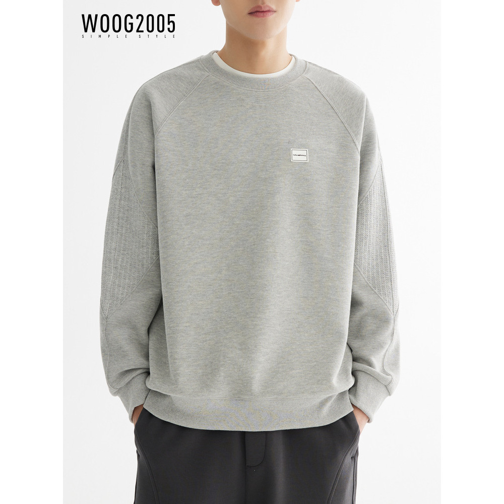 WOG2005 ผู้ชาย High-End เย็บรอบคอ All-Match สีทึบเสื้อกันหนาวผู้ชาย 2025 ฤดูใบไม้ผลิ All-Match แขนยา