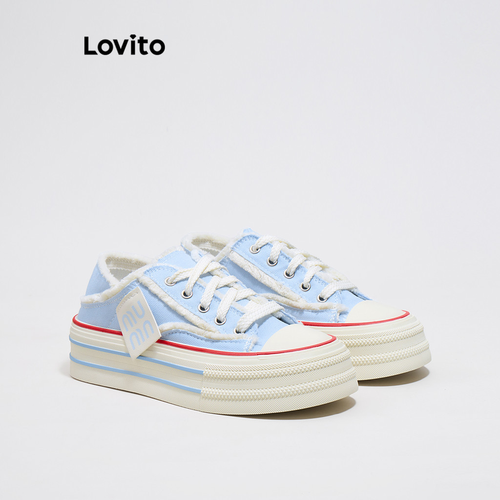 Lovito รองเท้าผ้าใบผู้หญิง พื้นหนา ขอบรุ่ย แต่งพู่ มีระบายอากาศสองทาง ลายตัวอักษร สไตล์ลำลอง LFA42098