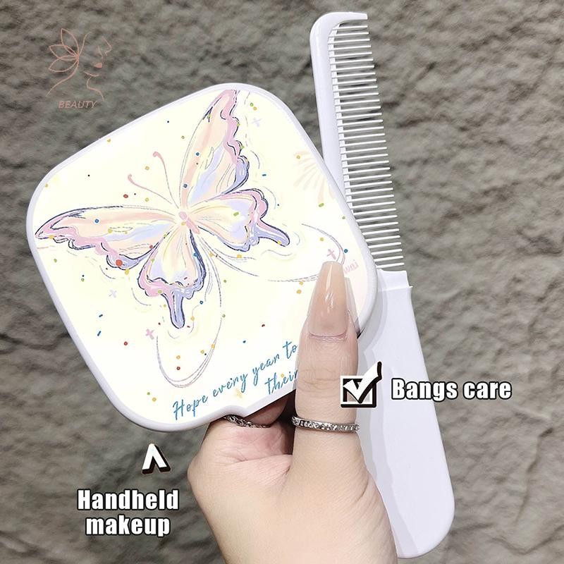 [เมย์บิวตี้] โบว์แบบพกพาน่ารักสีชมพูกระจกหวีมือถือกระจกหวีสกัดแบบบูรณาการแปรงผมนวดเครื่องมือจัดแต่งทรงผมทําให้กระจก {ไทย}