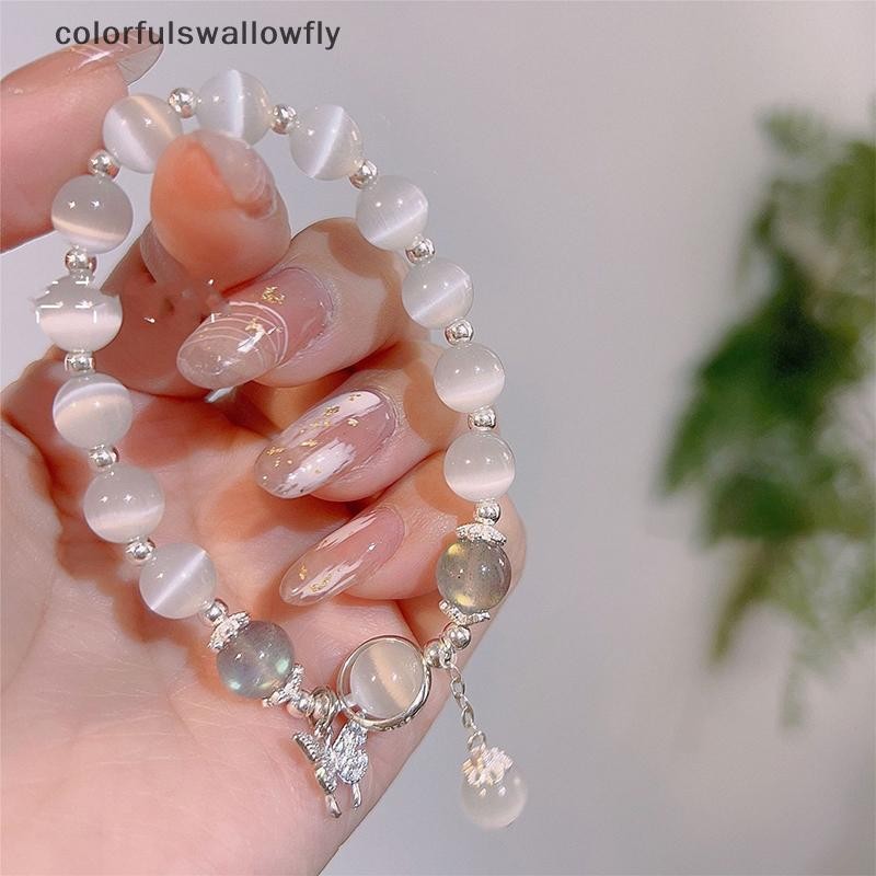 ที่มีสีสันสwallowfly แฟชั่นเกาหลีเลียนแบบโอปอลสร้อยข้อมือจี้ที่เรียบง่ายสร้อยข้อมืออินมูนสโตนคริสตัลลูกปัดดวงจันทร์จี้สร้อยข้อมือเครื่องประดับของขวัญปลาค็อด