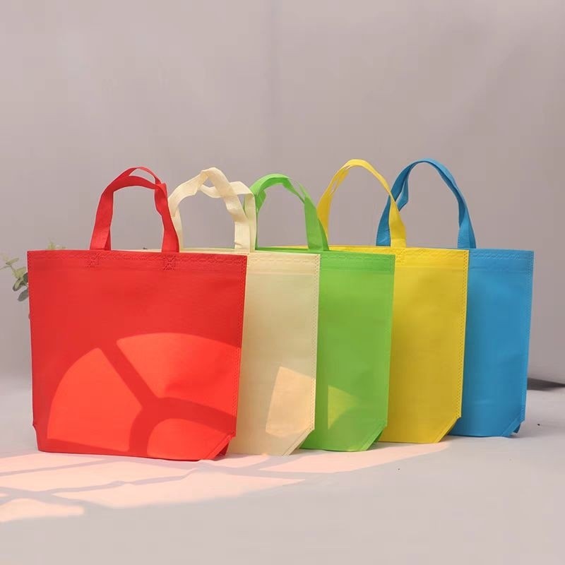 S001 ถุงผ้าสปันบอนด์ สีพื้น(กว้าง33*สูง26*ขยายล่าง10ซม) ทรงแนวนอนขยายล่าง ขายยกมัด 50 ใบ ขายส่ง พร้อมส่งทันที k.
