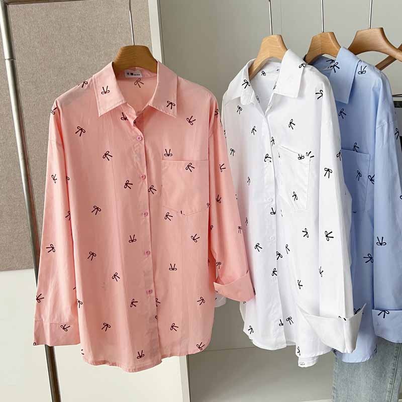 ในฤดูใบไม้ผลิและฤดูใบไม้ร่วงสวมเสื้อเชิ้ตผ้าฝ้ายแขนยาวพิมพ์ลายโบว์สีน้ําเงินสไตล์เกาหลีย้อนยุคสําหรับผู้หญิง