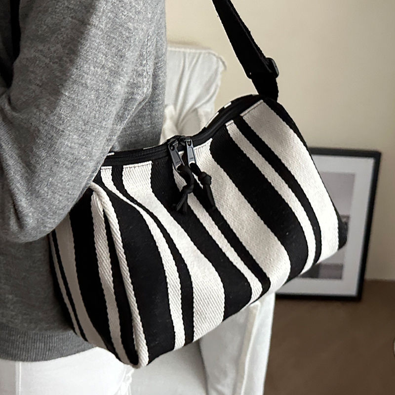 กระเป๋าผ้าใบ กระเป๋าสะพายข้างแฟชั่นสตรีอเนกประสงค์กระเป๋าสะพายไหล่ทรงกระบอก