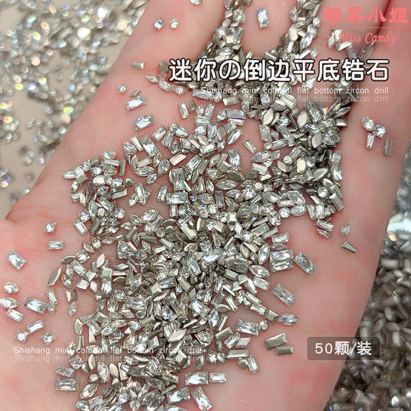 50 ชิ้นเพชรเพทายทรงเหลี่ยมฐานแบนคละขนาด ขนาดเล็ก รูปทรงมาร์คีส์ระยิบระยับ เพชรทรงแชมเปญสีขาวโปร่งแสง