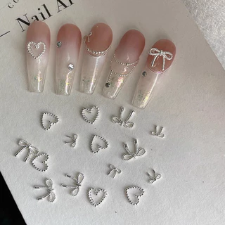 10ชิ้นชุดมินิโบว์แต่งเล็บเพชรเครื่องประดับ ผู้มีอิทธิพล ร้อนขายน่ารักหัวใจรักโบว์ผูกโลหะโลหะผสมสวมใส่เล็บอุปกรณ์แต่งเล็บ