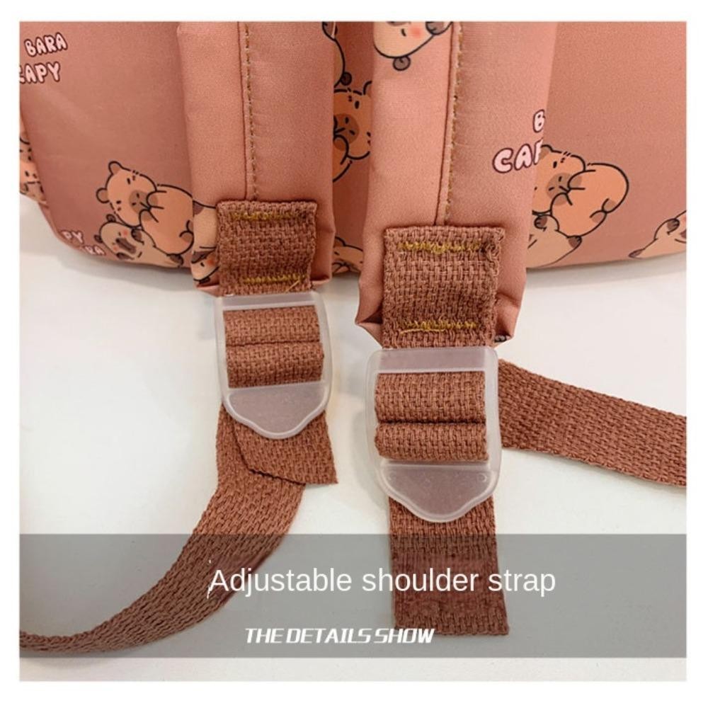 CNXIQU กระเป๋าเป้สะพายหลัง Capybara กระเป๋านักเรียนการ์ตูนนักเรียนระบายอากาศได้กระเป๋าหนังสือไนลอนความจุขนาดใหญ่พิเศษน่ารัก - รูปที่ 5