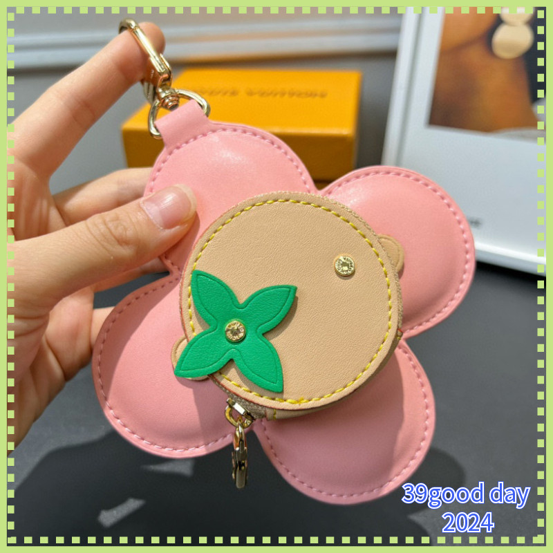 [ล-บ้าน] พวงกุญแจกระเป๋าดอกไม้แดดสี่สี/ 11152