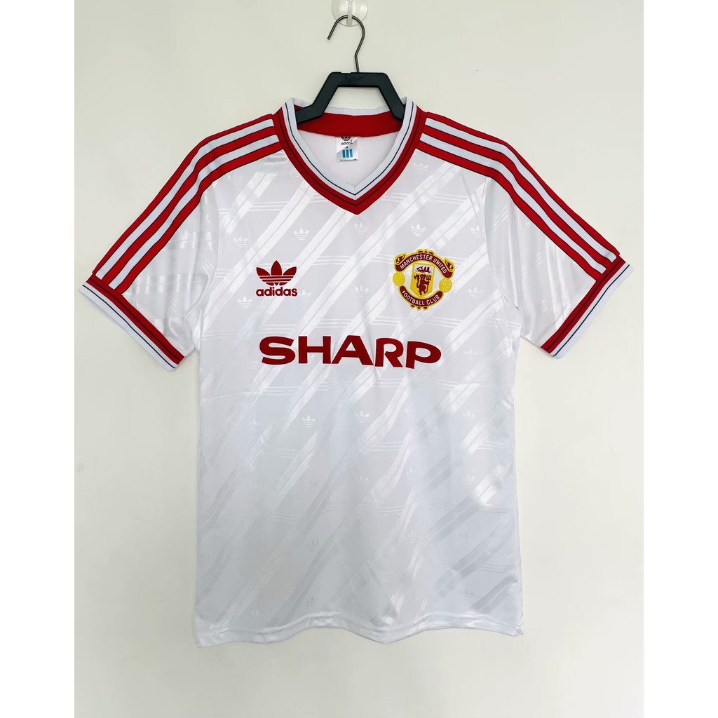 8688 เสื้อยืดแขนสั้นกีฬาฟุตบอลย้อนยุคสีขาวแมนยูเยือน