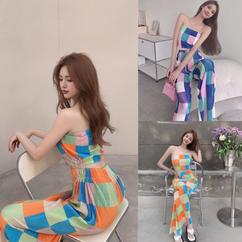 เสื้อเชิ้ตลายสก๊อตไม่มีสายหนังสวมคู่กับกางเกงขากว้างเอวสูง ดีไซน์ช่วยเสริมความสูงและผอมให้กับสาวๆ สไตล์เซ็กซี่