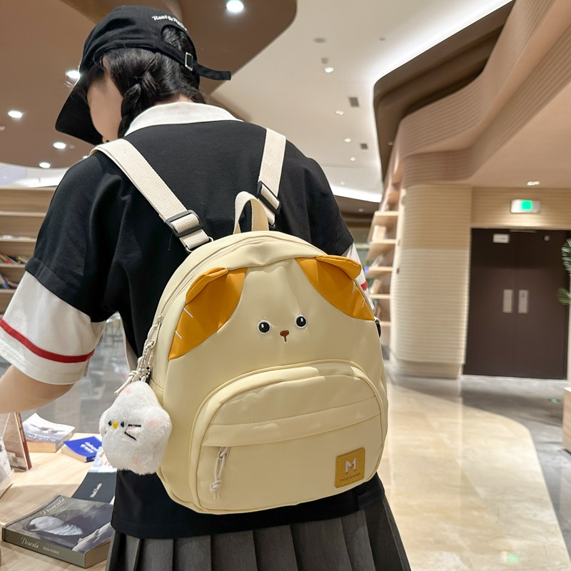 ญี่ปุ่นน่ารักการ์ตูนลูกแมวกระเป๋าเป้สะพายหลังสาวเด็กนักเรียนกระเป๋านักเรียนขนาดเล็กสดเดินทางกระเป๋าเป้สะพายหลังขนาดเล็กมัลติฟังก์ชั่ไหล่สามเ