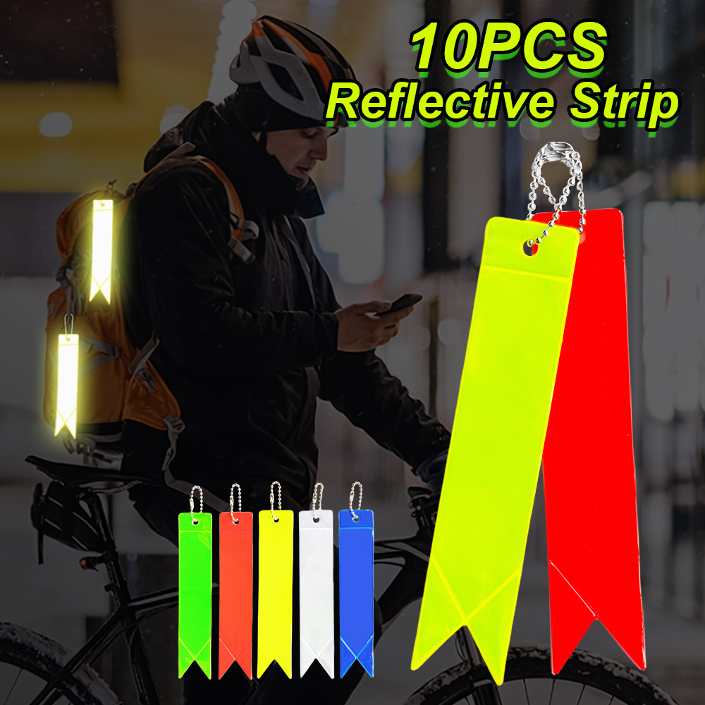 10ชิ้นที่มีสีสันสองด้านแถบสะท้อนแสงจี้พีวีซีแสงสูงความปลอดภัยสะท้อนแสงกระเป๋าเป้สะพายหลังพวงกุญแจเด็กของขวัญขนาดเล็ก
