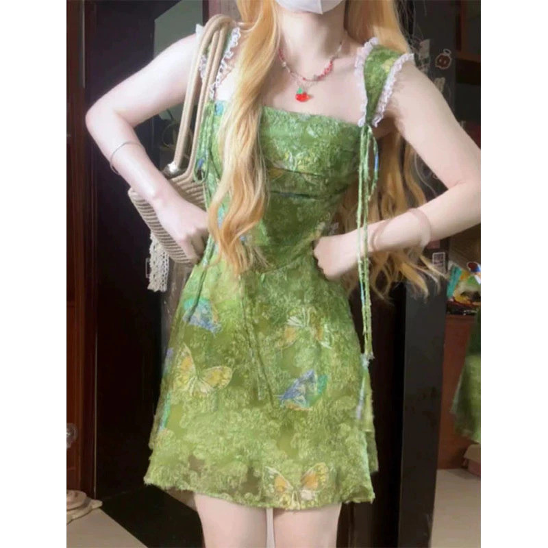 ฤดูร้อนผู้หญิงลูกไม้เย็บสไตล์อภิบาลกระโปรงเชือกแขวนคอชุดสไตล์หวานดอกไม้เปลือยสลิง