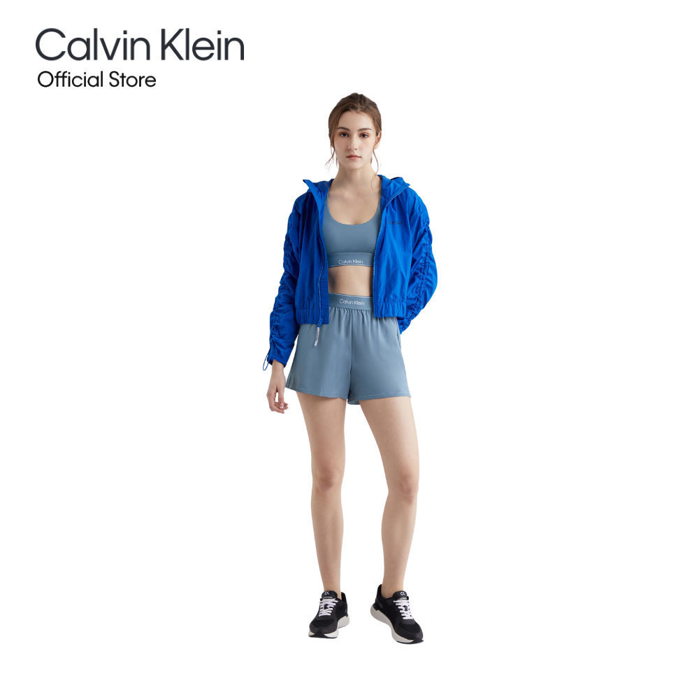 CALVIN KLEIN กางเกงออกกำลังกายขาสั้นผู้หญิง High-Rise Shorts รุ่น 4WS4S819 420 - สี CERAMIC BLUE