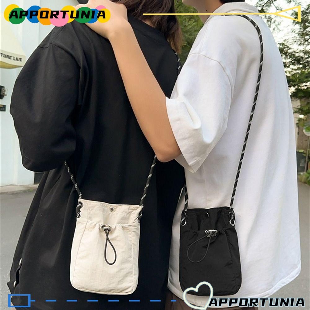 Apportunia กระเป๋า Messenger กระเป๋าสะพายผ้าใบน้ําหนักเบาแฟชั่นสไตล์มินิมอลสีทึบกระเป๋าใส่เหรียญขนาดเล็กสําหรับผู้หญิงผู้ชาย